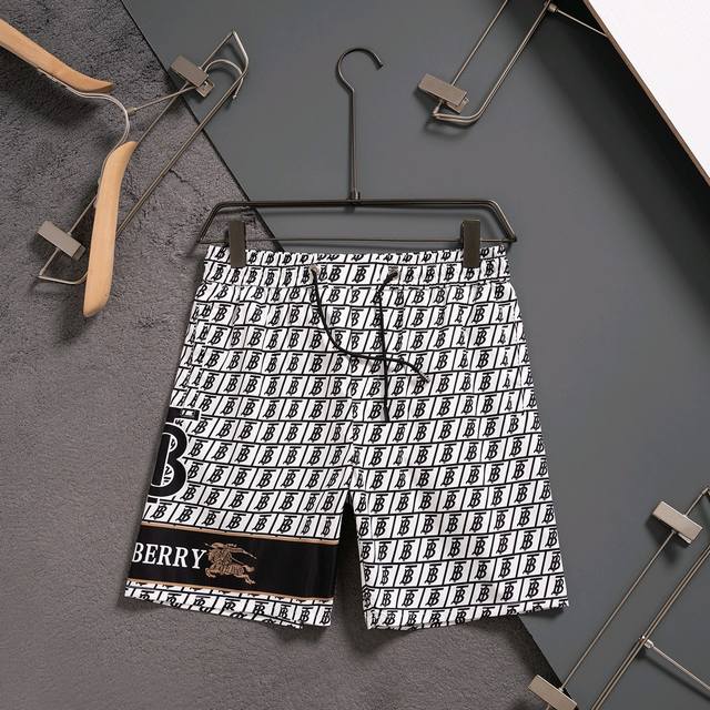 Burberry 巴宝莉 2025春夏季新款休闲高品质 速干裤梭织面料 沙滩裤，超高端品质3D数码印花工艺制作而成，原版复刻、整体提花最新字母联盟Logo图案设