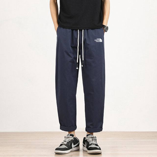 The North Face 北面裤子新款直筒纯色休闲裤 情侣九分裤卫裤 打破常规 不一样的穿搭，营造浓郁的未来科技感 紧追潮流，宽松版型 可以有效修饰腿部线条