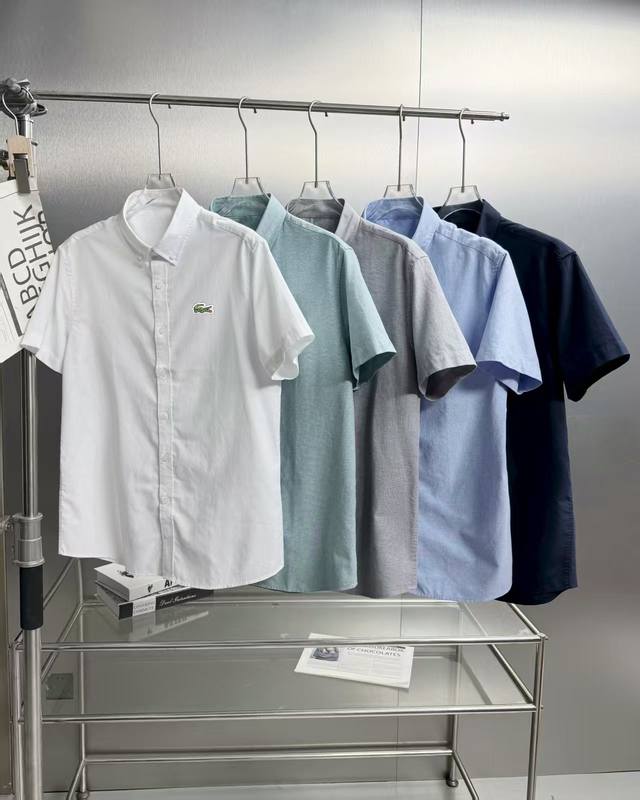 Lacoste 法国鳄鱼25Ss夏季新款顶级牛津棉布廓形翻领衬衣，男女同款经典刺绣宽松休闲短袖衬衫！贸易公司渠道稀出，同步官网发售！时尚与高级感并存的重磅衬衫，