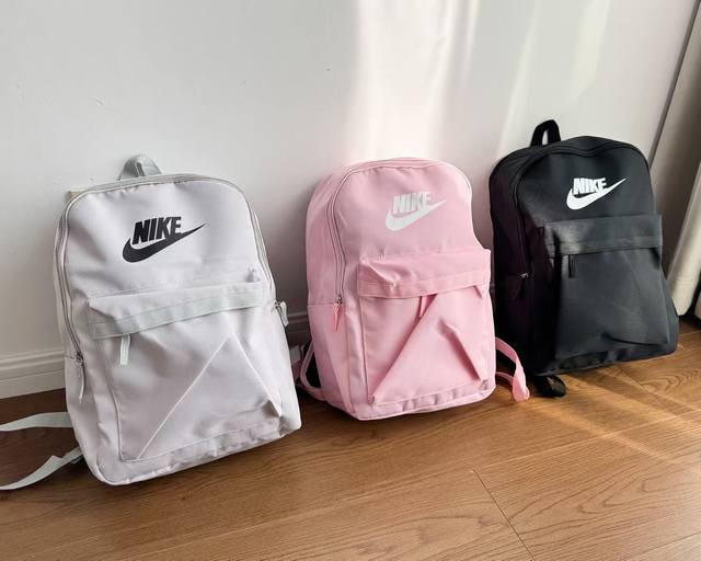 Nike耐克男女同款简约百搭休闲双肩包校园高中大学生书包时尚潮流大容量背包电脑包！颜色：黑色 粉色 灰色。尺寸:41×28..................