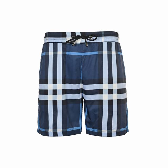 Burberry 巴宝莉 经典大格子沙滩短裤这款短裤采用薄款设计，无需担心闷热或出汗，轻盈自然。经典的格子图案在阳光下更显出夏日感，使您瞬间成为海滩的焦点。 后