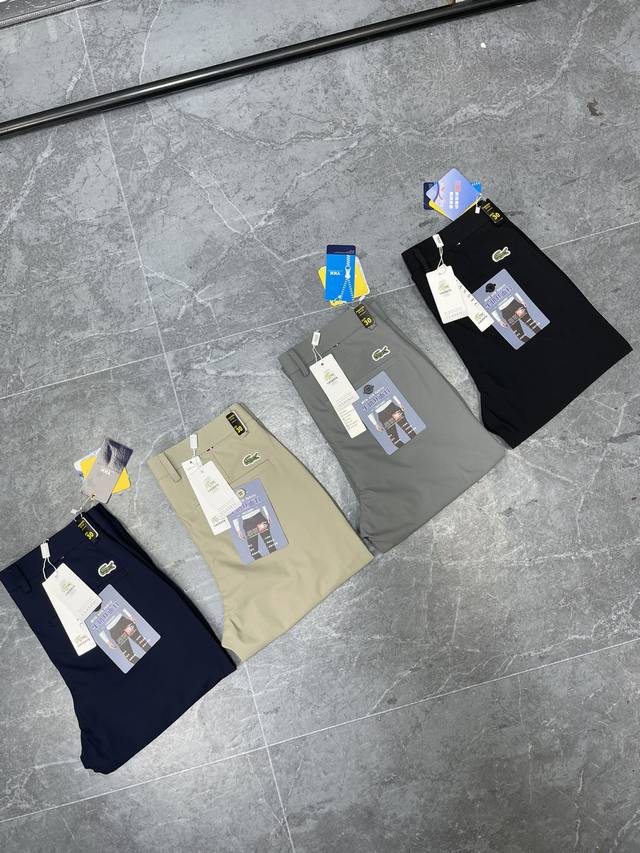 Lacoste 法国巴黎鳄鱼夏季男士后腰经典绿鳄鱼牛奶丝高弹力商务休闲裤西裤暴躁开始 后腰绿色小鳄鱼设计，锦上添花独特一笔.这条裤子给我的感觉，就好比一条婚礼西