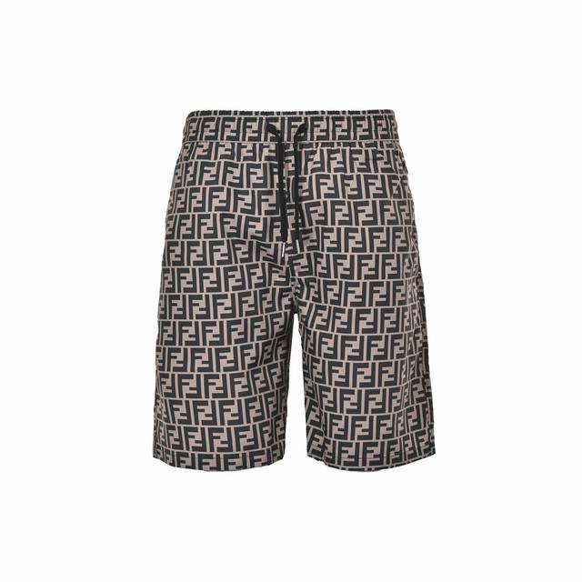 Fendi 芬迪 经典Ff满印尼龙短裤夏季渠道限定沙滩短裤，定制满印老花面料作为整条裤子的点睛之笔，更具个性高级，宽松的阔腿裤版型，上身秒变大长腿，手感柔软细腻