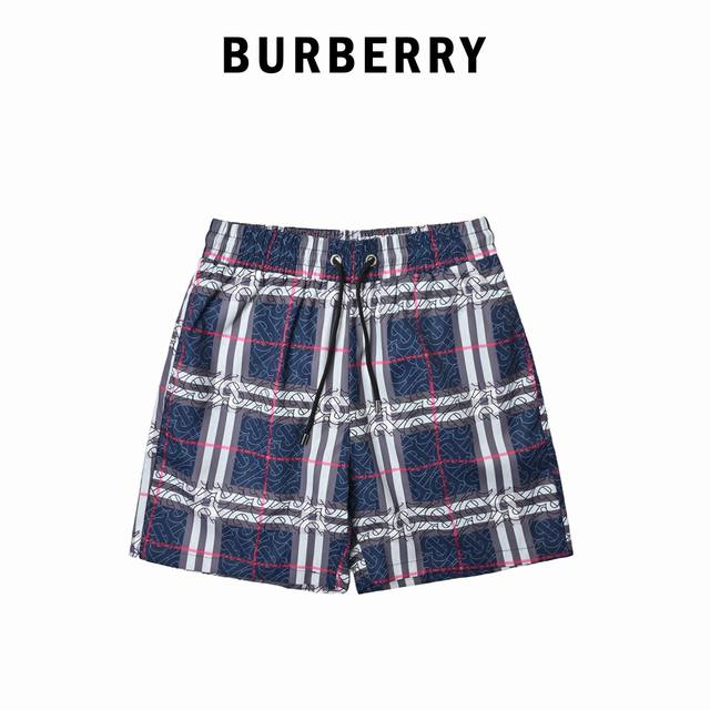Burberry 巴宝莉 经典大格子沙滩短裤这款短裤采用薄款设计，无需担心闷热或出汗，轻盈自然。经典的格子图案在阳光下更显出夏日感，使您瞬间成为海滩的焦点。 ，