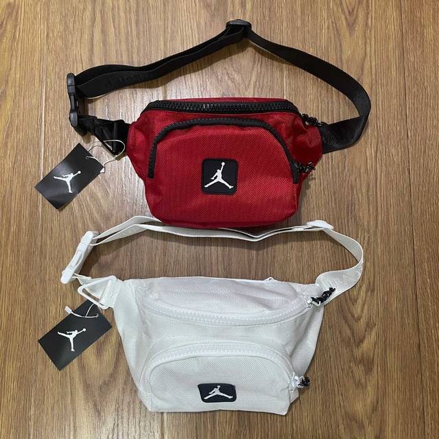 Air Jordan乔丹运动休闲Logo徽标胸包单肩斜挎腰包 男女同款情侣款颜色：红色 白色尺寸：28X10X16Cm材质：牛津布 244