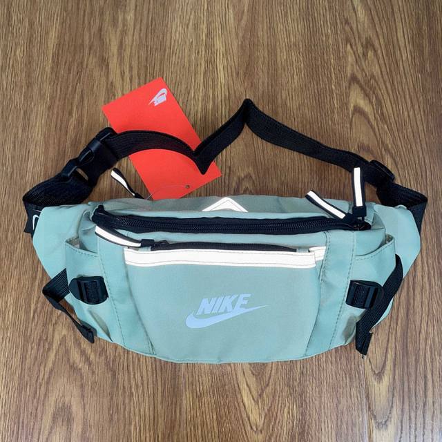 Nike耐克3M反光条多功能运动休闲腰包手提包单肩包斜挎包颜色：浅绿色尺寸：26X16X10 Cm 9