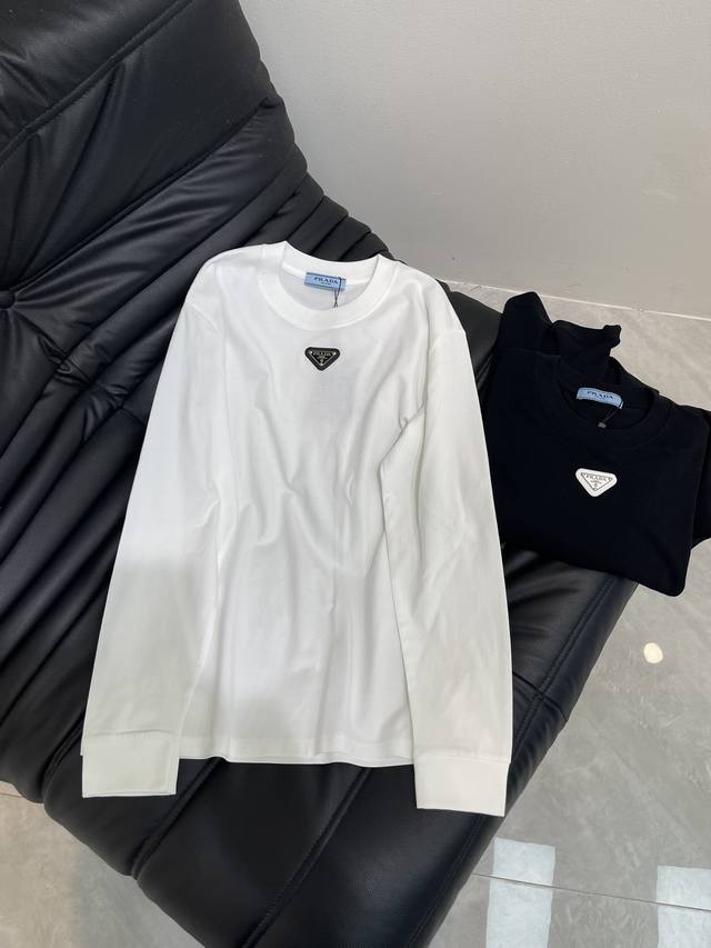 Prad*25早秋新款倒三角标休闲长袖T定位工艺 进口纯棉面料领口圆领设计倒三角标Logo字母宽松版型 男女同款薄厚度适中 可做打底Or单穿彰显时尚个性简约经典