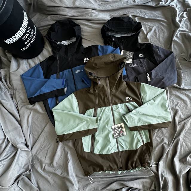 Cmf Comfy Outdoor Garment斜拉链机能硬壳压胶防水冲锋衣 采用Coexist 3层硬壳面料，自带Logo 耐水，20000Mm，透湿200