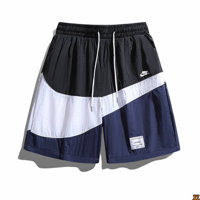 耐克 独家实拍上新夏季高品质工装短裤潮牌宽松休闲速干运动休闲裤五分裤，本季主打，货源充足，放心主推，高端品质，经典设计，做工出色，经典百搭，上身效果极佳