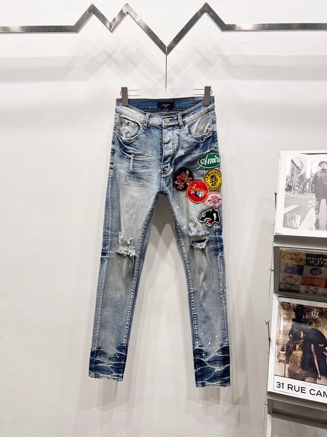 款号: C081 Amiri & 阿米日 新款牛仔裤绣花Logo水洗破洞图案牛仔小裤脚弹力牛仔长裤男女同款 辅料：辅料齐全，均为原包装，两张吊牌，区别外面低端版