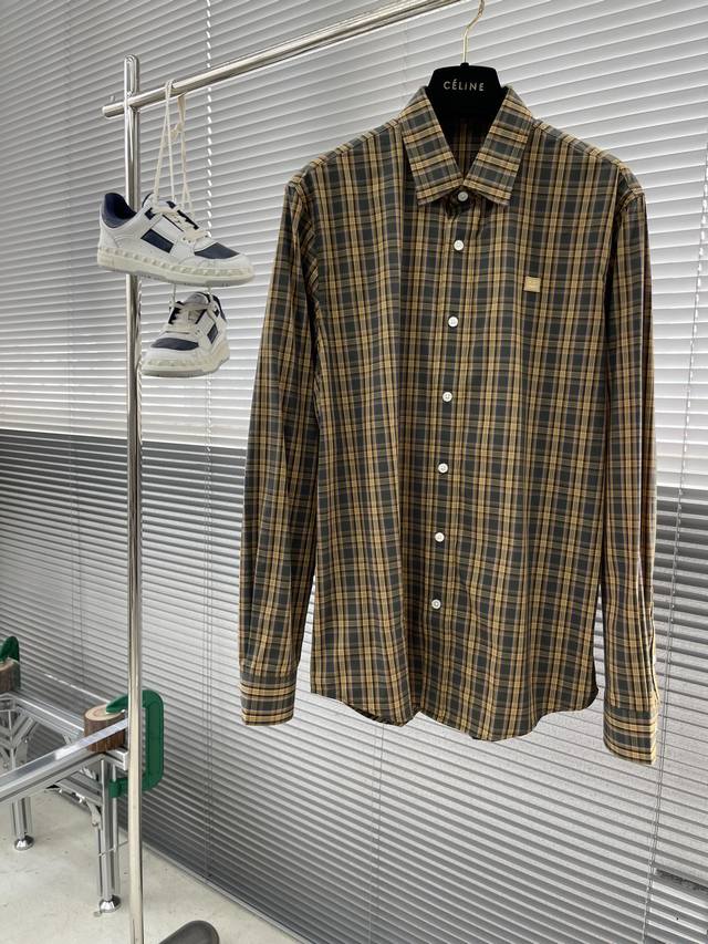 秋冬 -Acne Studios 格纹标识刺绣笑脸小细节棉府绸衬衫。 明扣款贝壳扣，面料质感不错舒适透气。 尺码:S-Xxl S码衣长75 胸围99 肩宽44