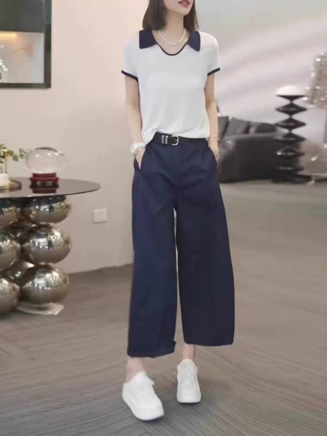 码数：S-M-L-Xl-Xxl 颜色：杏色~深蓝色 面料：针织~聚酯纤维 描述： 弹力超强的针织上衣，胖瘦穿起来都有不同的味道 上衣针织撞色短袖衫衫织法就是看起