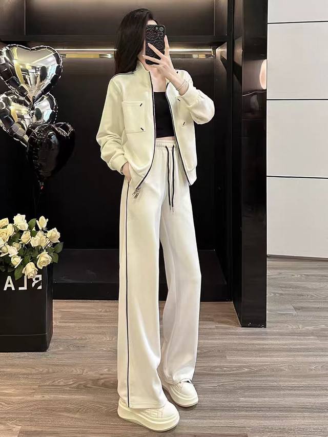 码数：S-M-L-Xl-Xxl 颜色：白色 面料：棉 上身感觉贴合身材比例线，拉链的设计时髦有型 不会显肩宽，特别的能遮肉显瘦，慵懒随性有创意 在休闲的运动套装