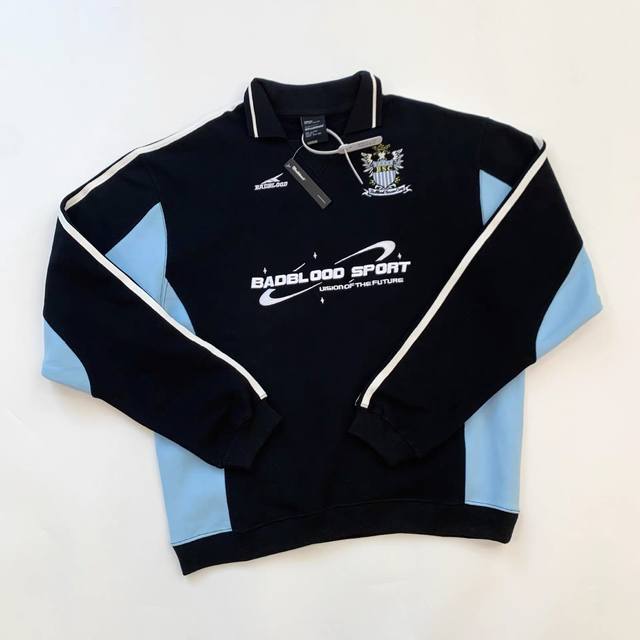 新款上架 白底图拍摄中 Badblood韩潮美式复古重工刺绣翻领球衣拼色Polo领长袖卫衣 宽松百搭 男女同款 款号：2203 P价： 颜色：黑拼蓝 尺码：S