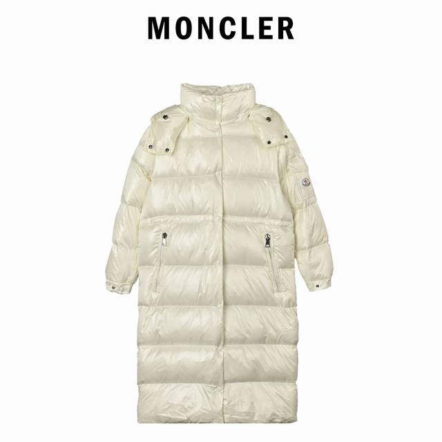 长款女式束腰羽绒服 : 内里黑色每一件羽绒服至少经过 道工序加工 最高蓬松度可以达到800十让穿着更保暖5A级标准 采用德国防绒针每三厘米高达11针日本田岛机制