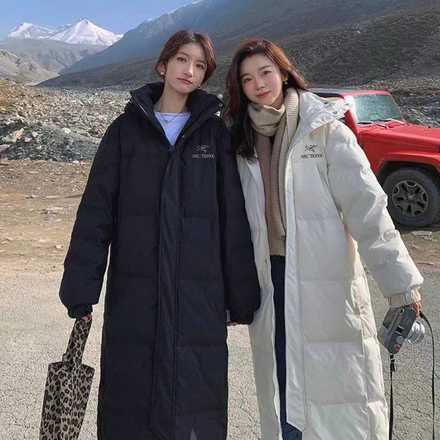 Arc'teryx 始祖鸟情侣连帽长款羽绒棉服 大货爆款重磅来袭 优质90白鸭绒 800高蓬松 绝对的高品质版本 整体是简约休闲版型 ，高端大气百搭！ 面料采用