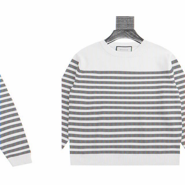 古驰 Gucci Logo提花圆领针织毛衣 意大利奢侈品牌古驰 Gucci 的一款毛衣，设计特点如下： 品牌标识设计：正面以红色刺绣呈现品牌名称“Gucci”，