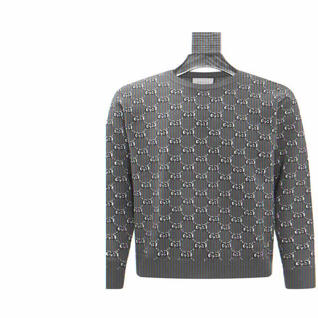 古驰 Gucci 满印Logo提花圆领针织毛衣 意大利奢侈品牌古驰 Gucci 的一款毛衣，设计特点如下： 品牌标识设计：满幅采用品牌标志性的双G图案，通过立体