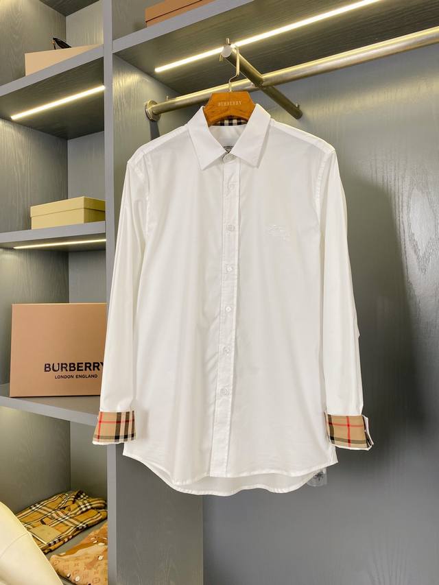 长袖骑士战马装饰弹力棉衬衫 经典Burtb系列，男女万年青同款，衬衫中的王者！经典战马微标刺绣设计！进口塔罗贝壳纽扣 ！市场上极其少有的产品。 衬衫直以来都是这