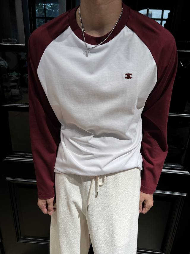 Celine 2025早秋新款刺绣小标男女款拼色长袖T恤 一整个被这件T恤美住了。独特的拼色设计，色彩搭配高级又吸睛，轻松打造出时尚感和层次感。而且是男女同款哦