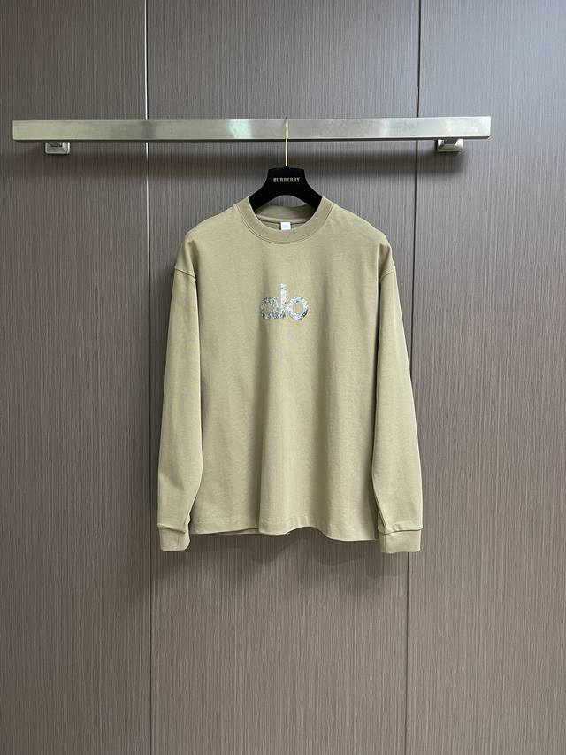 Alo 简约经典大字母Logo印花情侣圆领长袖T恤，原版定制 G纯棉双纱面料，面料缩水控制在2％出口级固色品质，真正做到不易变形 缩水不掉色，罗那高密度螺纹领口