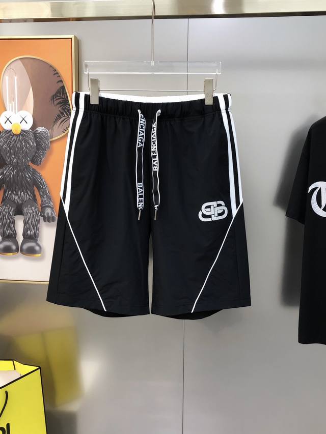 Bal*Nciaga 巴黎世家2025春夏新款原单男士休闲短裤 柜台同步售卖高端定制 时尚百搭款撞色 立体印胶Logo图案设计 定制原版进口100%聚酯纤维速干