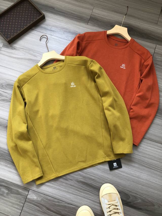 Kail*S丨石家 徽标Logo刺绣 立体剪裁 男款运动休闲徒步登山圆领长袖卫衣T恤. 颜色：黄色 橘色. 材质：锦纶氨纶混纺面料 工艺：刺绣. 尺码： M L