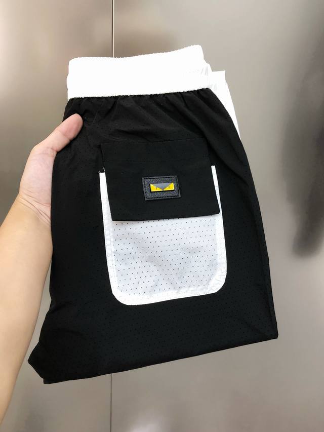 Fd 芬迪2025春夏新款原单男士休闲长裤 柜台同步售卖高端定制 时尚百搭款拼色 激光打孔雕刻工艺 绣萌眼Logo皮标设计 定制原版进口100%聚酯纤维速干面料