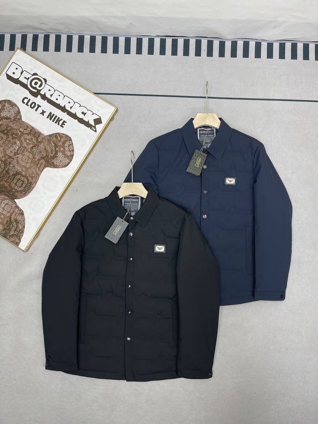 新款上市 Armani 阿玛尼Ea7 轻便保暖商务行政休闲纯色羽绒服外套 经典款羽绒服，面料轻质舒爽，直身剪裁，轻便有型。锁温科技叠加，多方位为冬季运动生活御寒