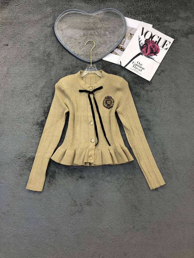 小香风金属扣蝴蝶结鱼尾毛衣 Smlp