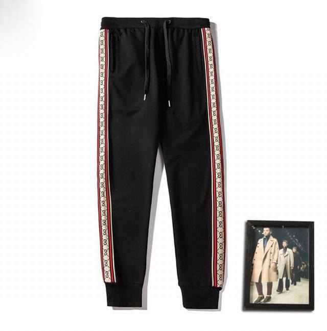 Guc 古奇 春夏装新款休闲裤 运动裤 简洁大气上档次，进口纯棉面料，夏季不挑身材又容易凹造型 设计风格，简约百搭，避免了视觉上的一体化，穿上多一分青春活力，必