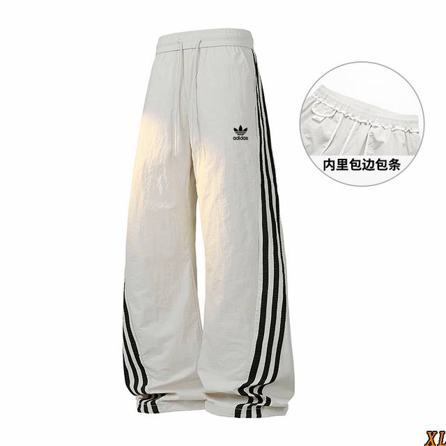 三叶草 独家实拍上新夏季高品质锦纶塔丝隆冰丝三条杠阔腿速干长裤，本季主打，货源充足，放心主推，高端品质，经典设计，做工出色，经典百搭，上身效果极佳