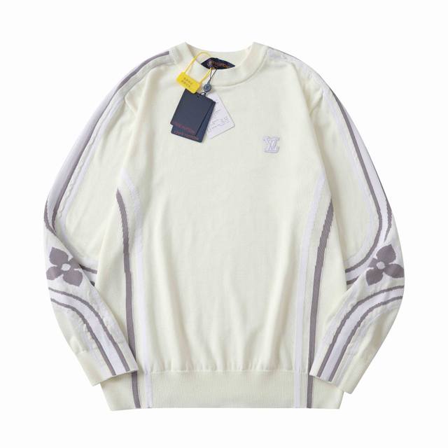 Louis Vuitton 滑雪手臂花卉针织毛衣 工艺说明：选用科技绵羊毛混纺面料，轻盈保暖，适合雪坡运动或日常休闲穿搭。衣袖与侧面饰有流畅的嵌花标识图案，肘部