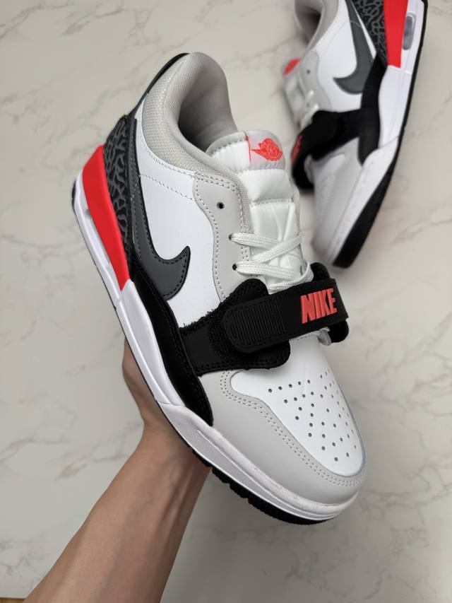 合作私 Air Jordan Legacy 312 有着交错结合的设计，它的名字就展现出它所包含的鞋款元素，312 分别对应了 Air Jordan 3、Air