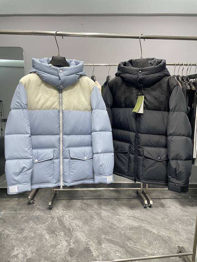 Gu25Fw秋冬新款高密度尼龙防水连帽中长款羽绒夹克，男女同款！撞色拼接经典Gg暗纹提花时尚拉链羽绒服外套！贸易公司渠道稀出，同步官网发售！作为品牌的标志性象征