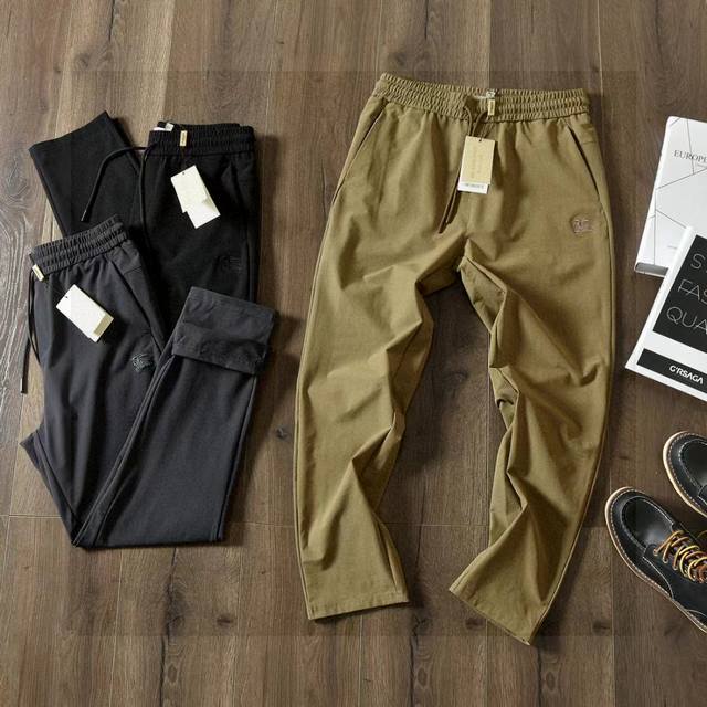 上新 商务 休闲 百搭 DDD 巴宝莉Burberry 男子2026春季锥子版型梭织 刺绣Logo 运动休闲长裤 DDD 品名:巴宝莉 小脚 刺绣 梭织裤 DD